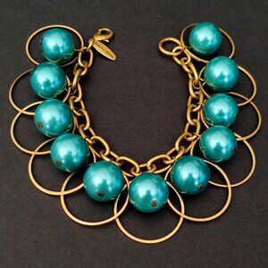 Metallic teal beaded hoop statement bracelet